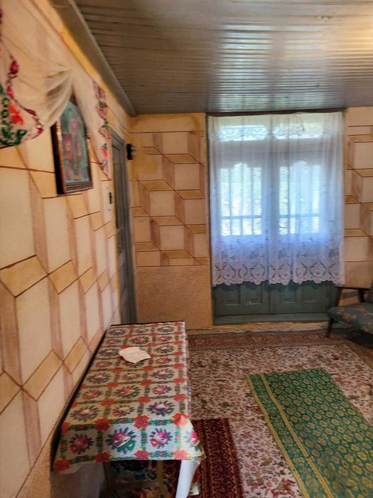 Casă caramida Radoiesti cu teren de 1.138 mp și deschidere la două străzi – 50.000 lei negociabil