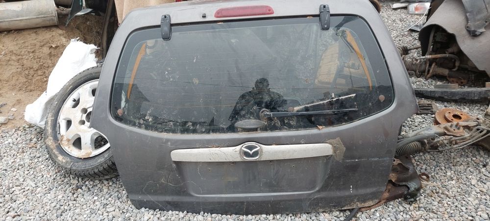 Мазда трибьют багаж