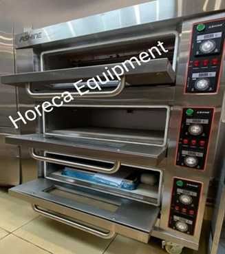 Печь подовая с пароувлажнением и шамотным камнем.