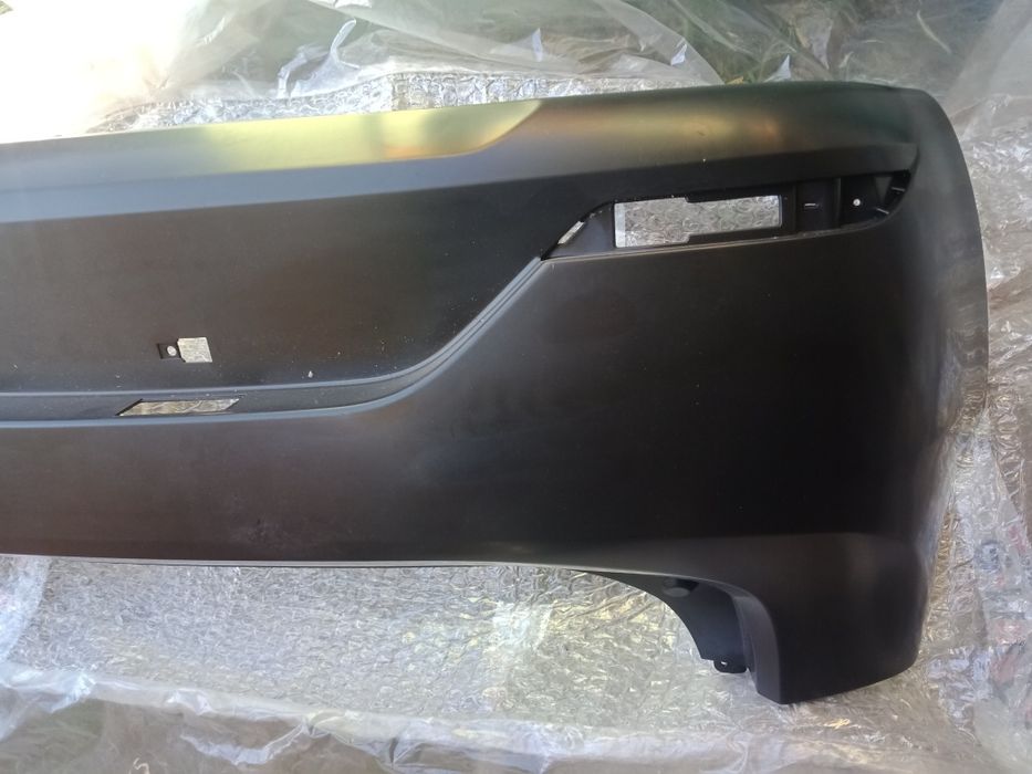 Бампер задний на Kia Rio