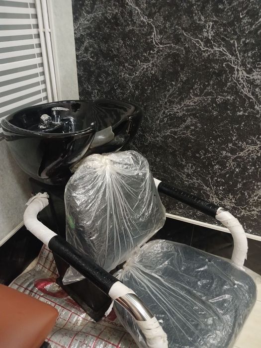 Сартарошлар бош ювиш столи