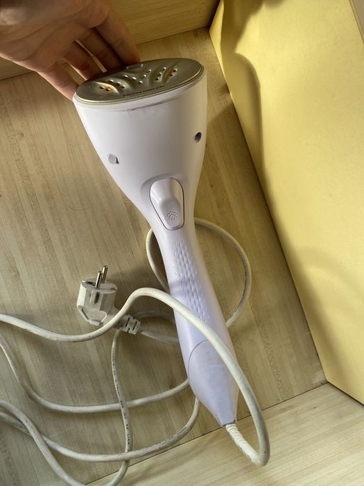 Уред за вертикално гладене Philips