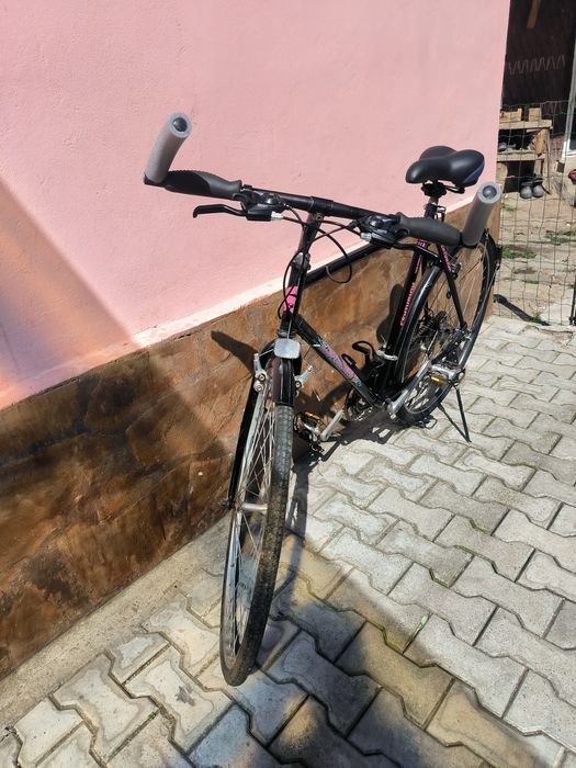 Vând bicicletă 4x4