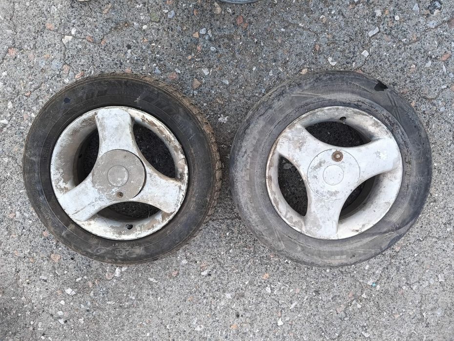 За 15 тысяч 2 колеса на титановых дисках r14 на мазду кронос Турция