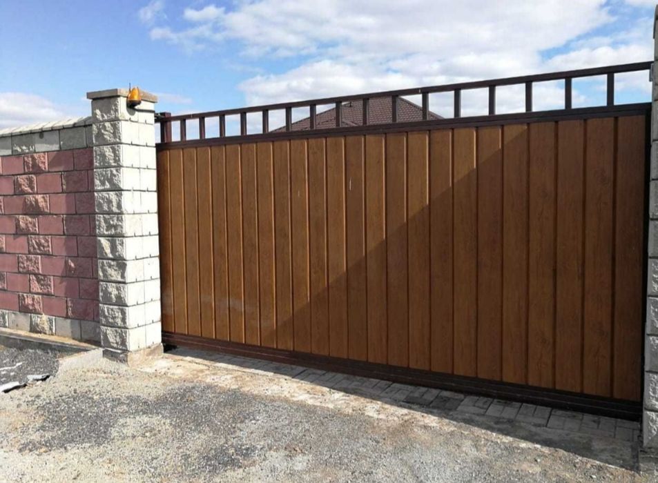 Заборы ворота из проф листа и сайдинга