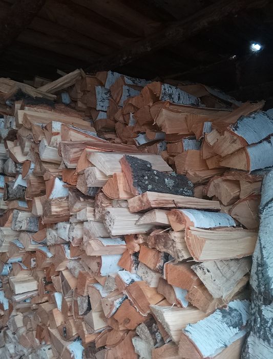 Дрова колотые в мешках