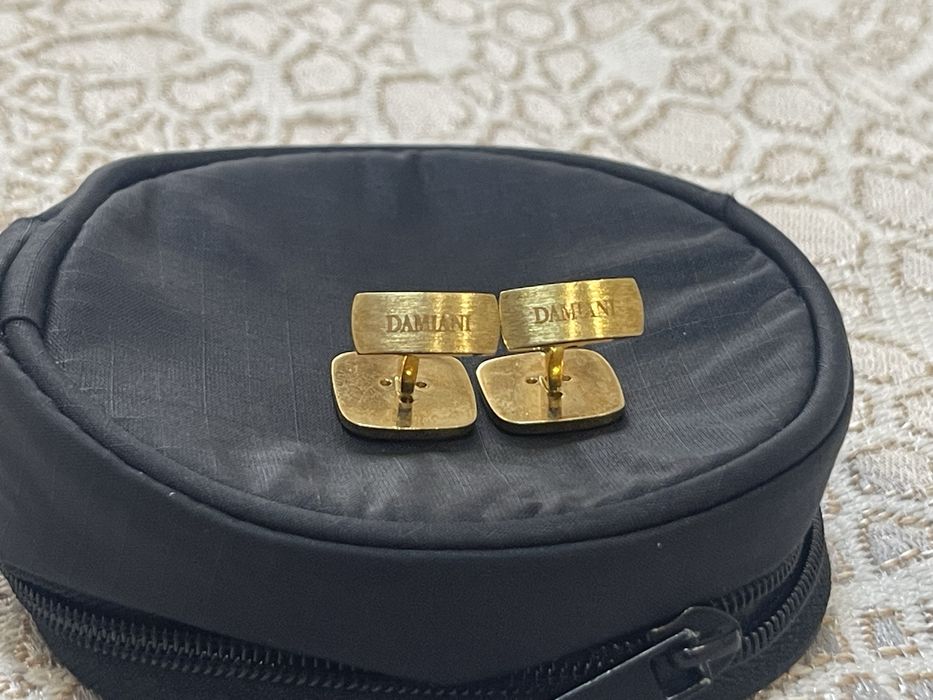 Золотые запонки Damiani