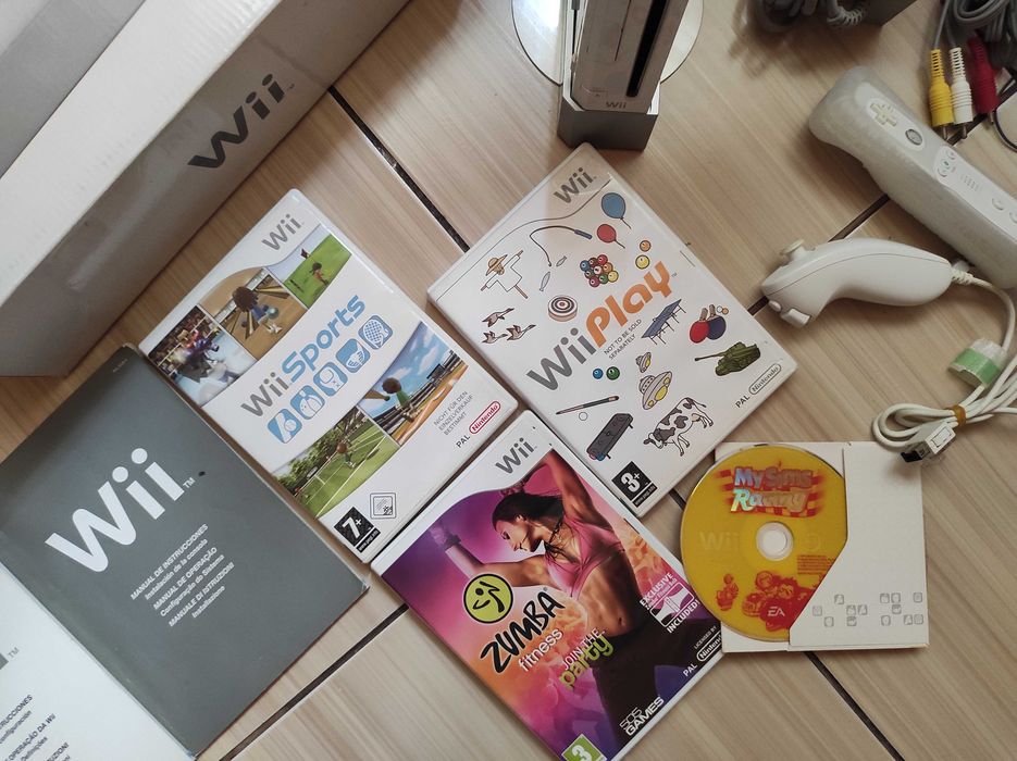 Nintendo Wii full box cu toate accesoriile originale si jocuri incluse