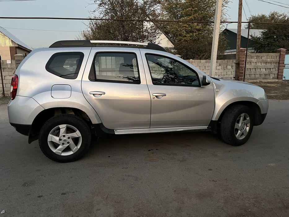 Renault Duster 2013г. 2л