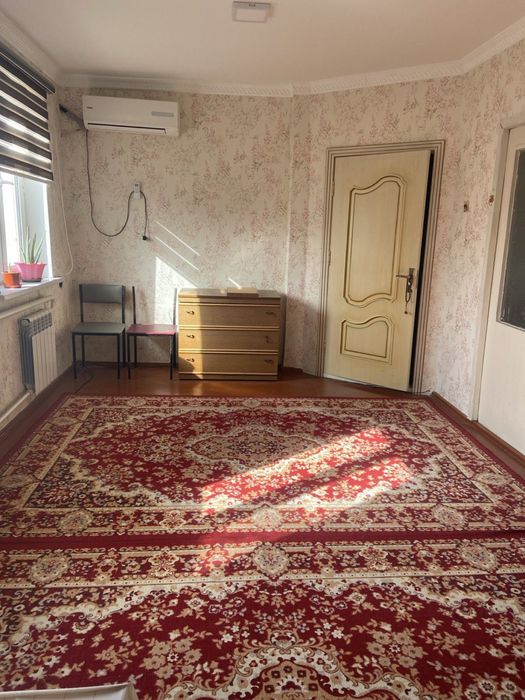 Двухэтажный дом с пристройкой