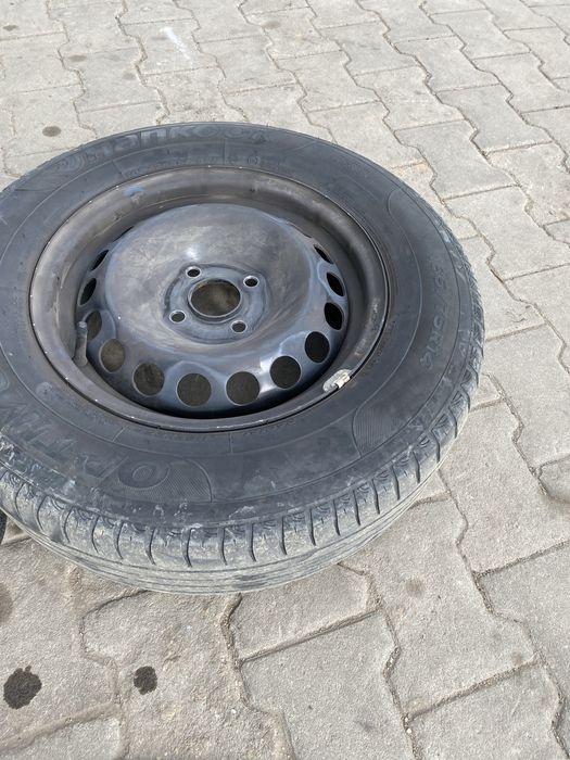 Продам шины с дисками и колпаками