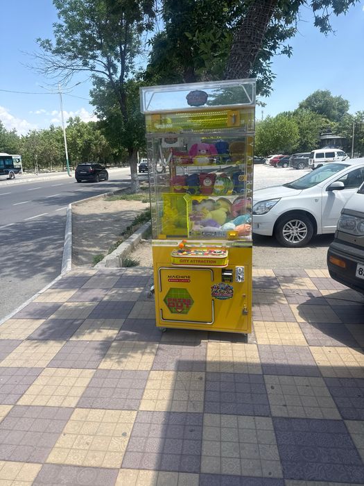 Игрушка аппарат кран хватайка
