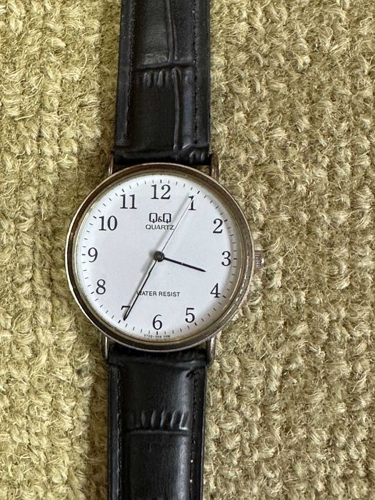 Ceas barbatesc Q&Q