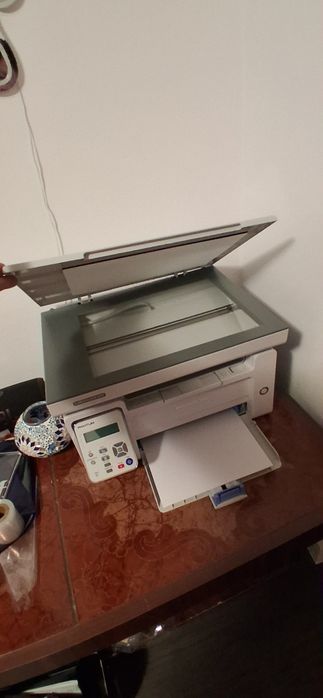 Imprimantă multifunctionala laser