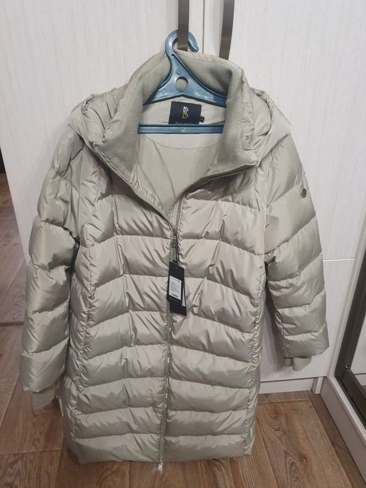 Продам пуховик новый