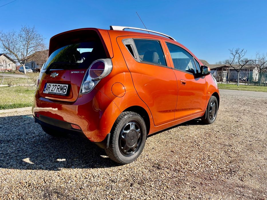 Chevrolet Spark Bomboană portocalie de la unic proprietar!