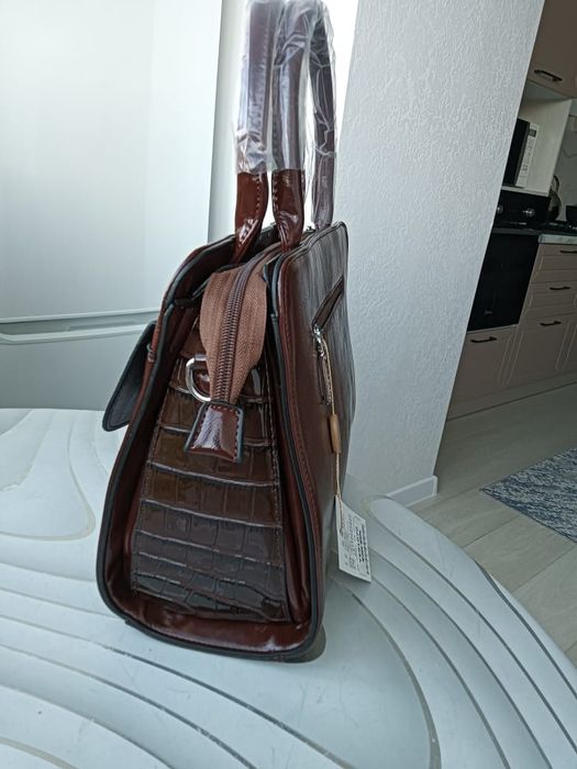 Продам  оригинал  сумку фирмы    Tosoca