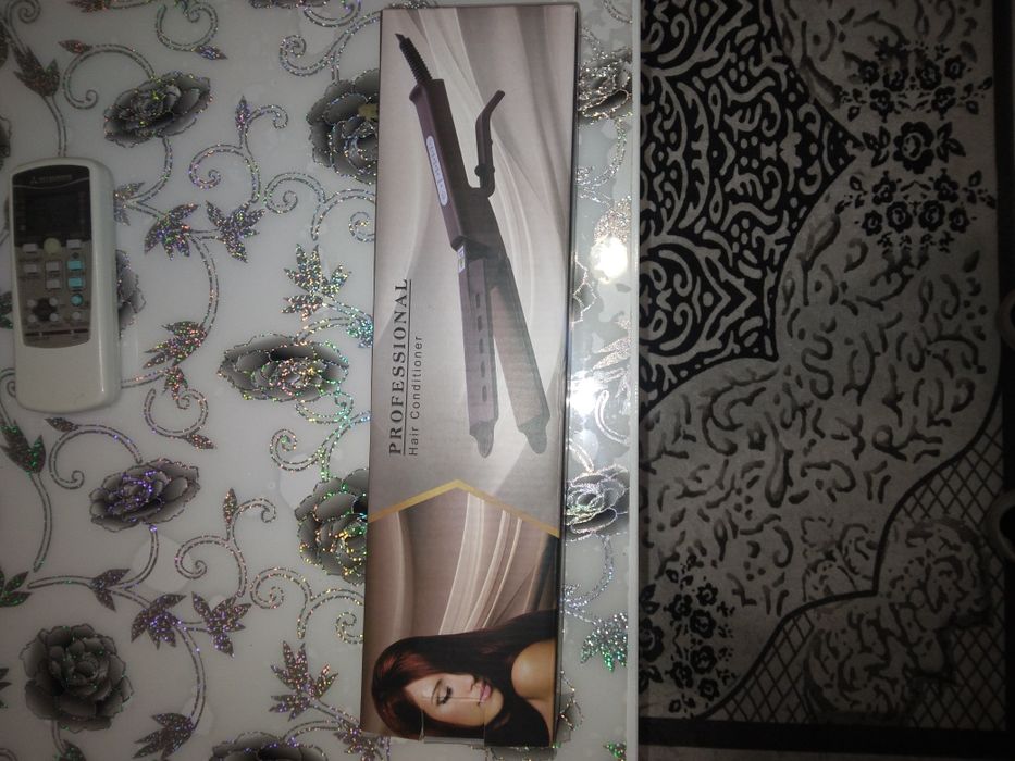 Преса за коса за изправяне