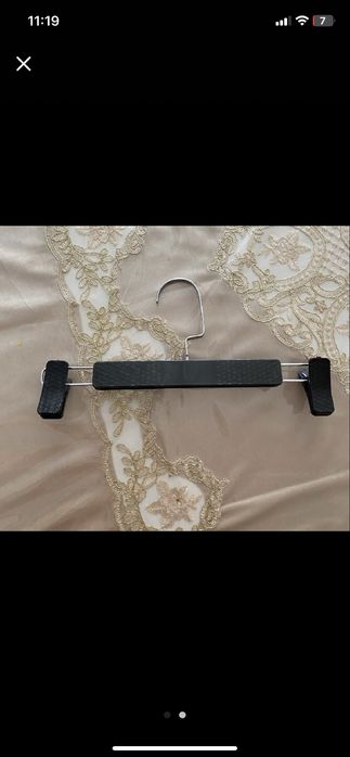 Магазин ва уйда шим илиш учун вешилка