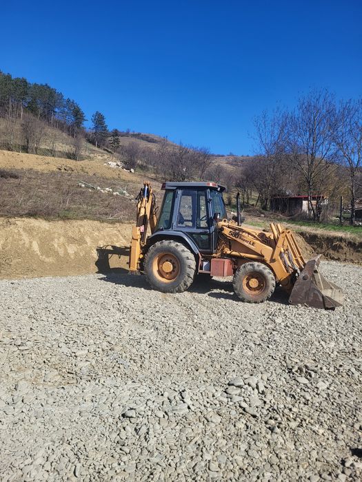 Vând buldoexcavator case 580sle