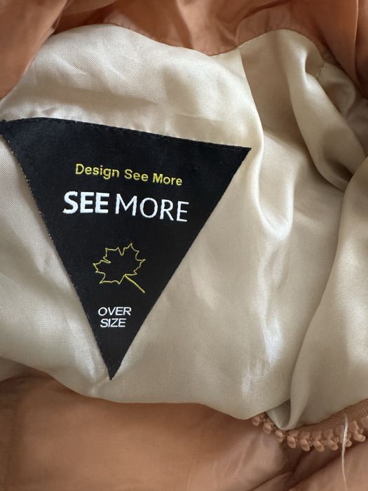 Женская куртка коричнева