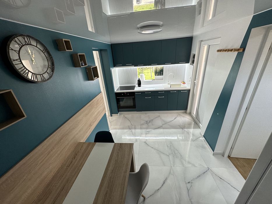 Cazare Regim Hotelier  casuta din livada