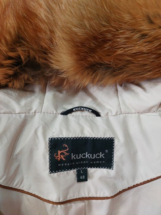 Продам пуховик теплый