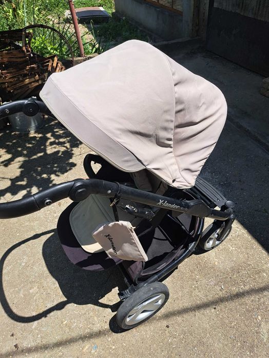 Бебешка количка X-lander с много подаръци към нея