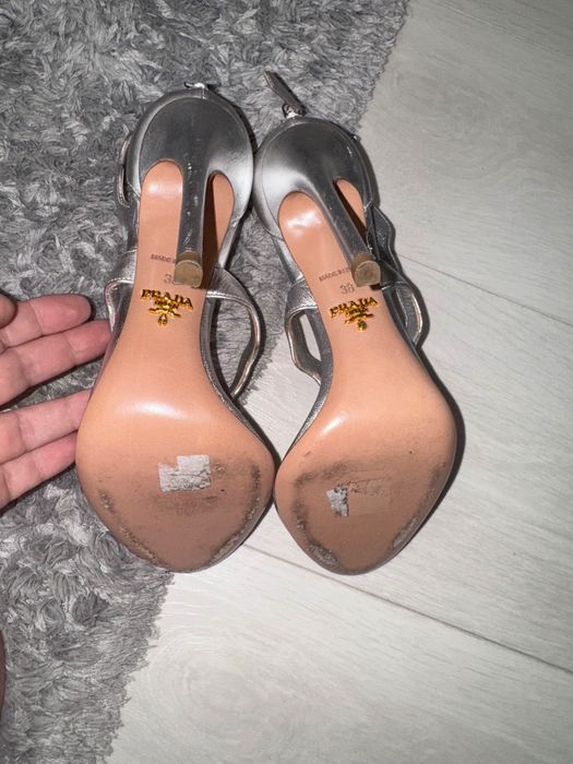 Prada scalloped silver metallic leather heels.