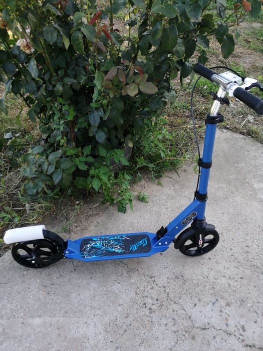 Trotineta/pliabila/DISC/suspensie dublă/frână duală/aluminiu/max:100 kg