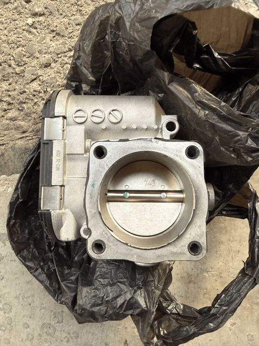 Дроселовата клапа  MAGNETI MARELLI Audi A4 B6 бензин