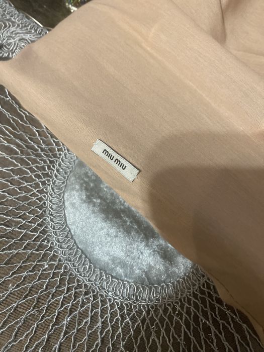 Geanta noua, Miu Miu