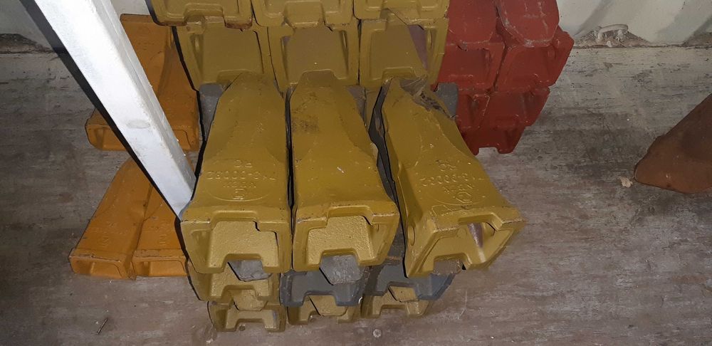 Режущие элементы ковша (коронки адаптера бокорезы)