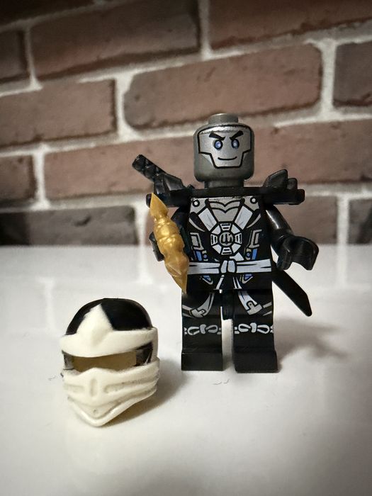 Minifigurină LEGO Ninjago Zane Deepstone Armor Possession