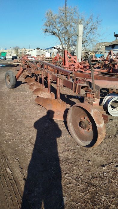 Плуг-9корпусный прицепной