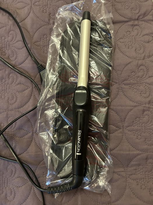 Ondulator Remington cu clapeta