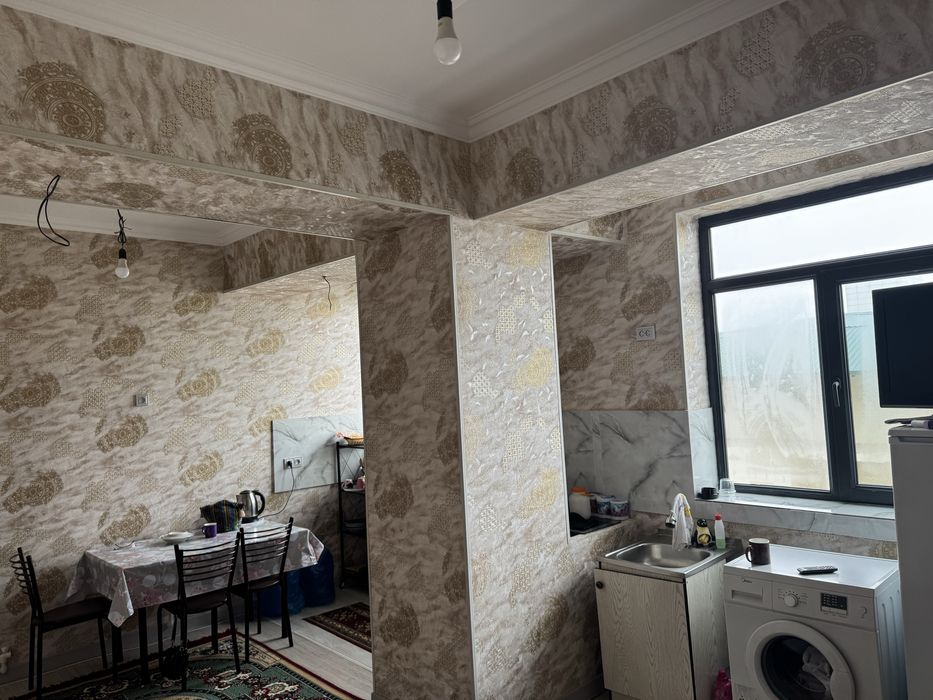 Бирхоналик ва икки хоналик бирта килинган общий площад 107 кв метр