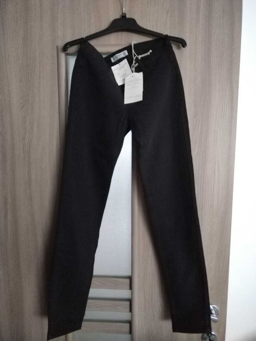vand pantaloni noi de fete, mar. 32, de la Pull and Bear