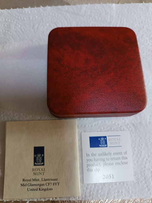 Монета серебряная.