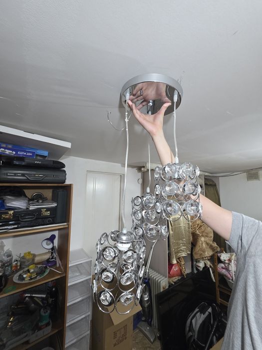 Люстра новая серебристого цвета