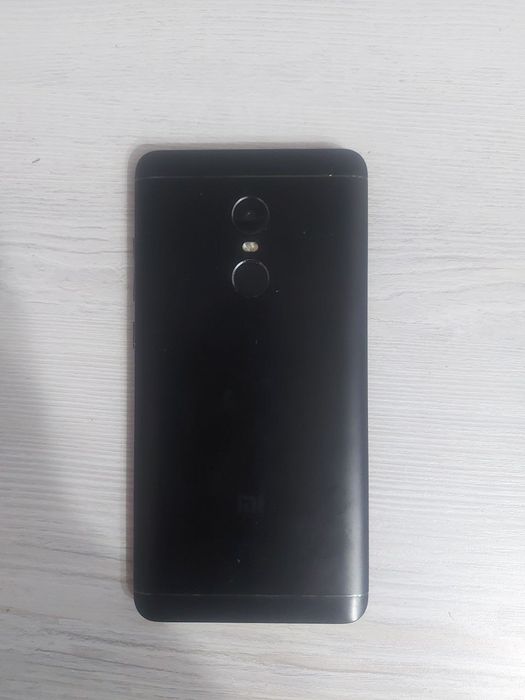 Телефон ми RedMi Note 4.  
600 000