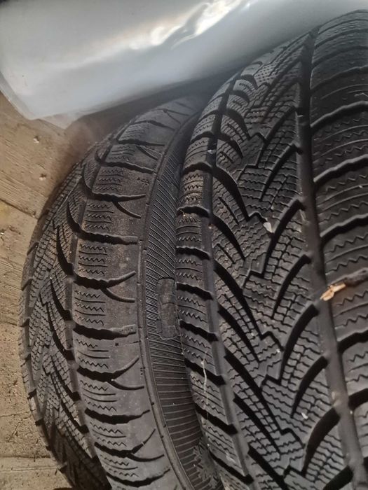 Продавам 8 гуми с джанти и тасове 5×112