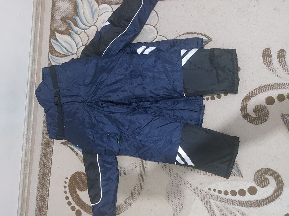 Зимний комбинезон новый