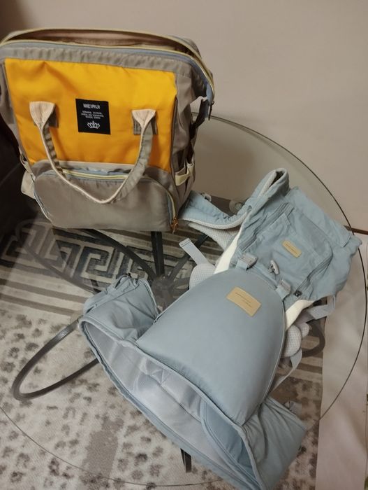 Хип сит.и сумка для мамы..пользовались очень мало больше пролежало..ка