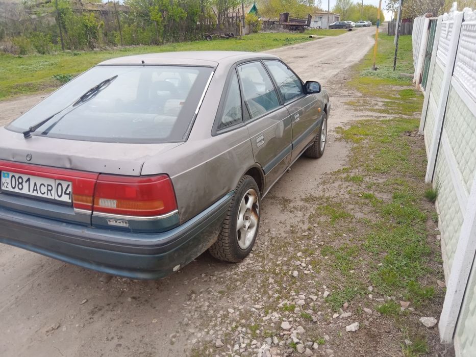 Мазда 626 gd  на полном ходу