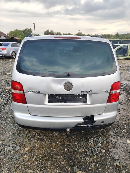 Piese motor cutie ușa haion cârlig dpf caseta scaun caseta direcție alternator compresor clima electromotor ceasuri bord  modul fuzeta vw Touran 1.9d