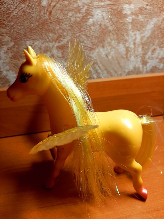 Детская игрушка лошадка