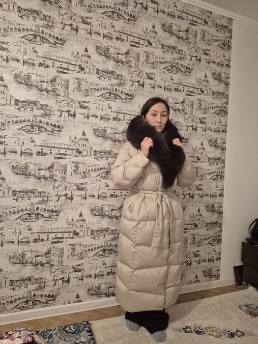 Продам пуховик зимний новый