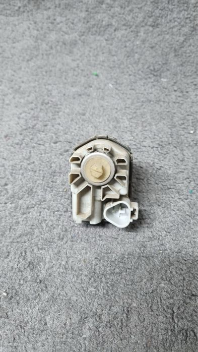 Корректор моторчик фар koito Toyota