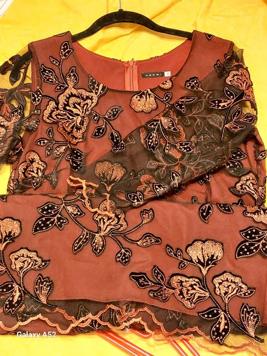 Rochie elegantă din dantelă.